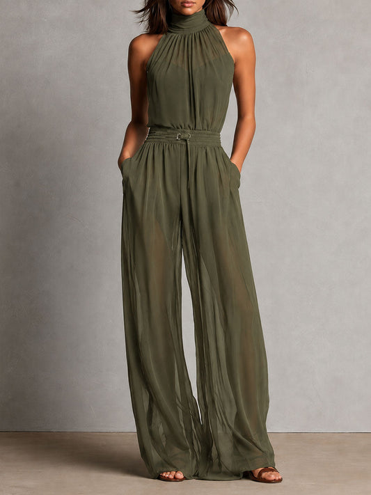 Jumpsuit nera con collo alto trasparente – dettaglio 2