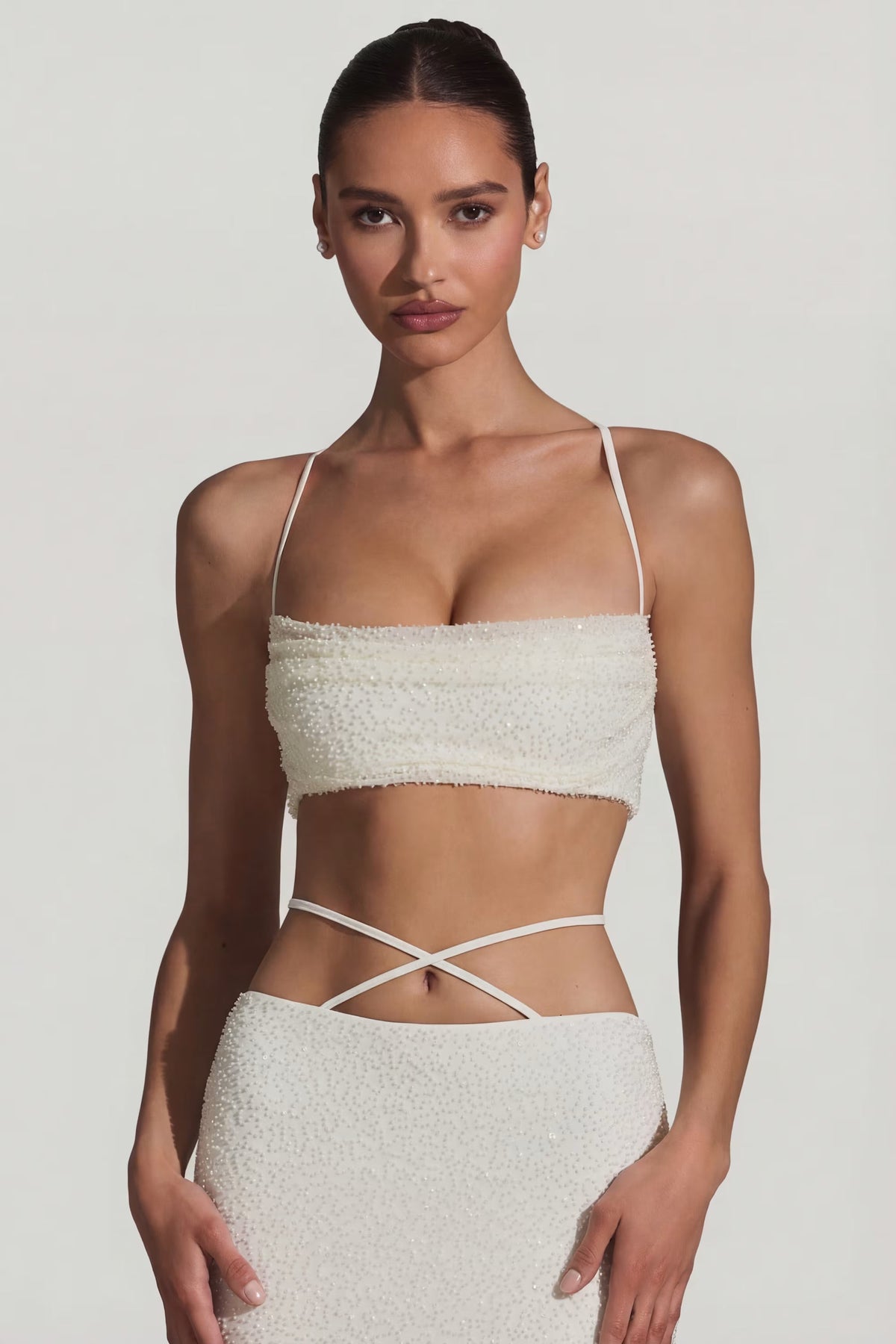 Top bianco con spalline incrociate – foto 5