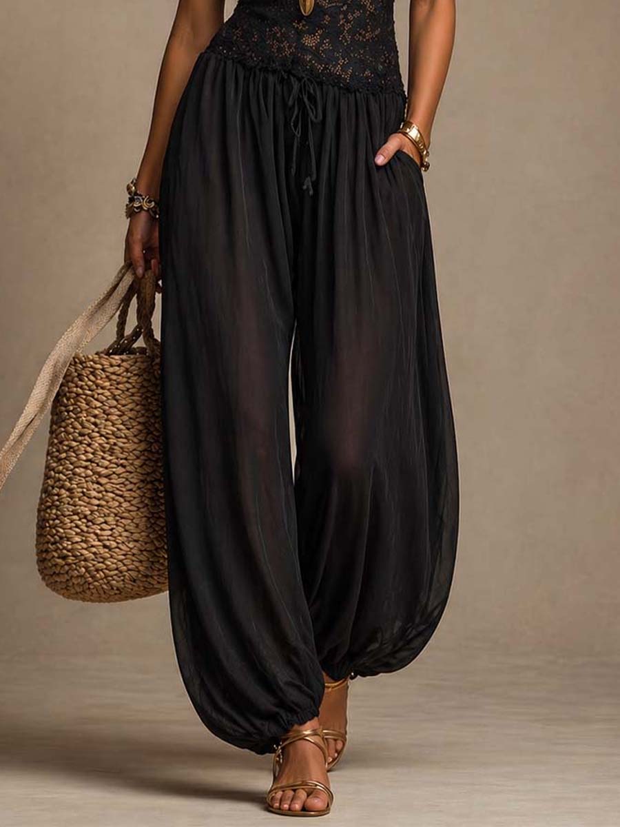 Jumpsuit harem nera in pizzo e chiffon – dettaglio 6