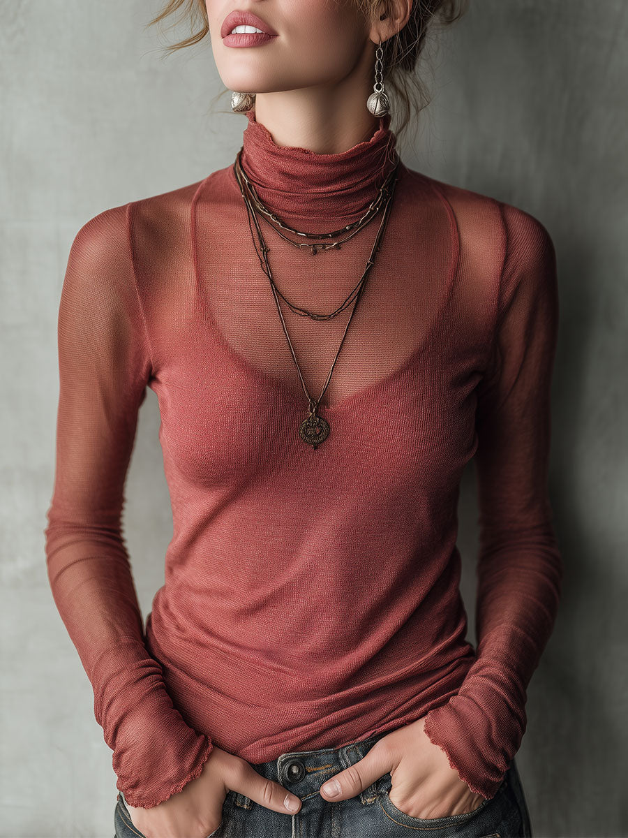 Maglione aderente color lampone a collo alto – vista frontale