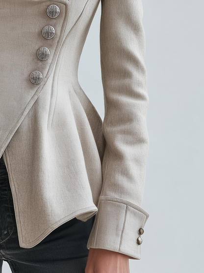 Blazer peplum avorio – dettaglio dei bottoni