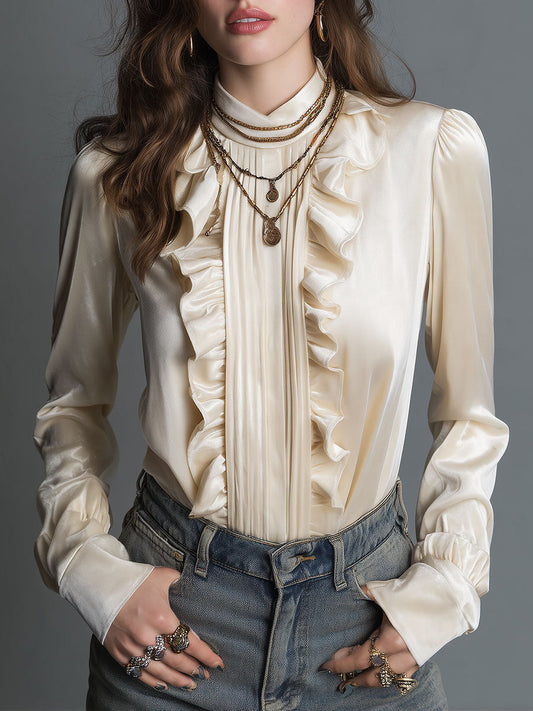 Blusa in velluto bianco sporco con volant – vista frontale