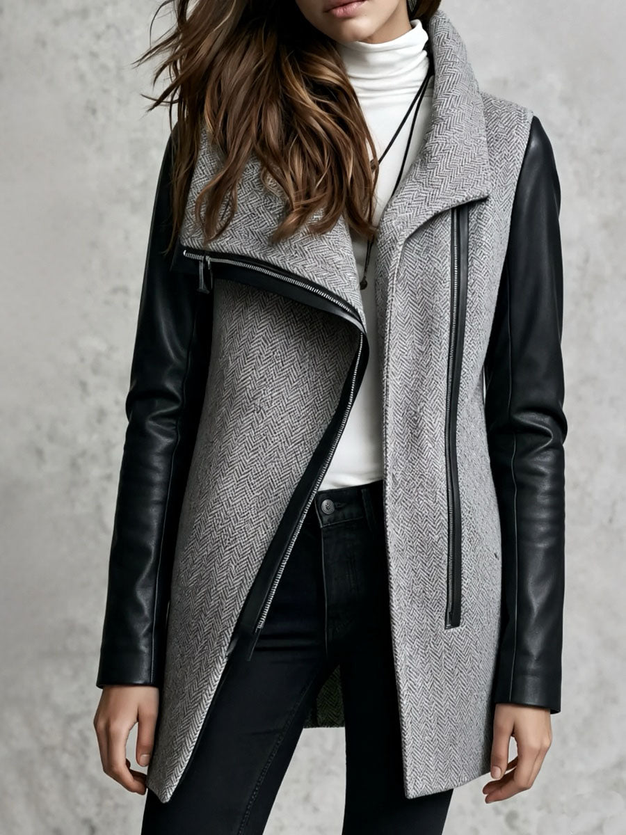 Cappotto grigio in lana spigata con maniche in ecopelle – vista laterale