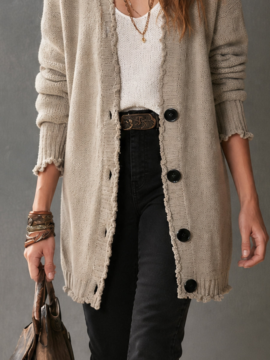 Cardigan color avena con bordi sfrangiati – dettaglio