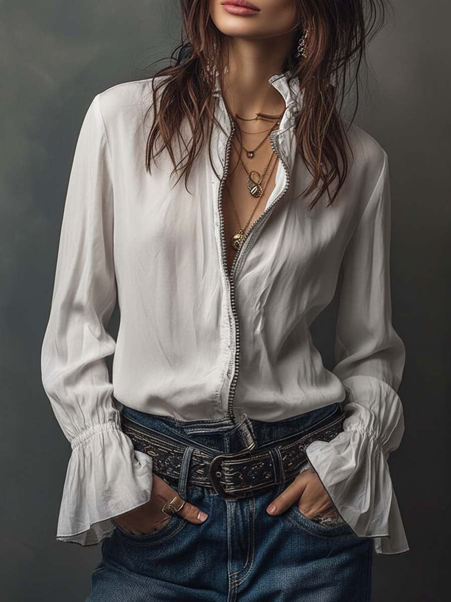 Blusa con zip sul davanti e polsini con volant – vista frontale