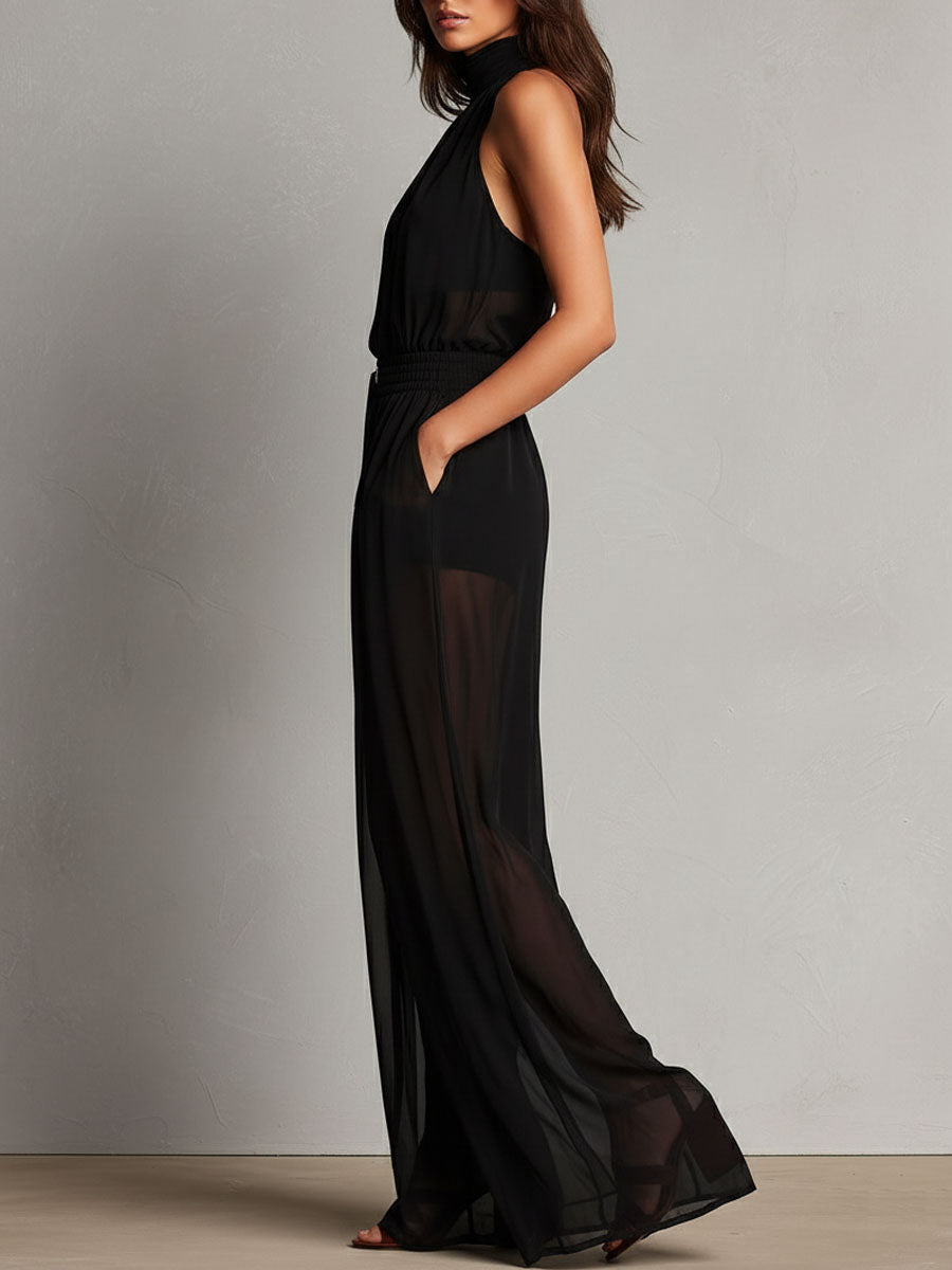 Jumpsuit nera con collo alto trasparente – dettaglio 7