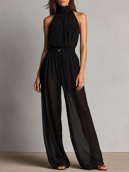 Jumpsuit nera con collo alto trasparente – dettaglio 5