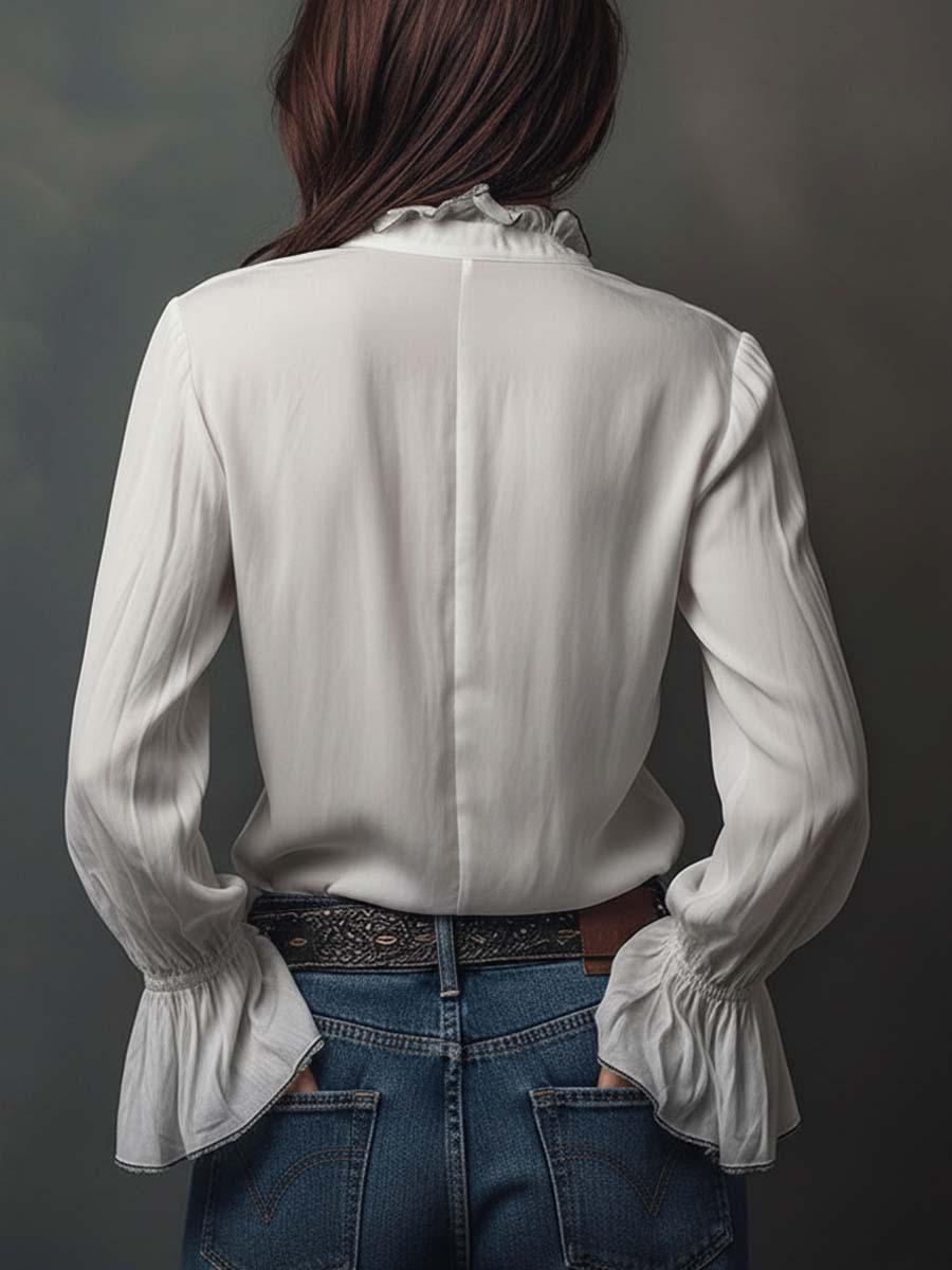 Blusa con zip sul davanti e polsini con volant – dettaglio 5