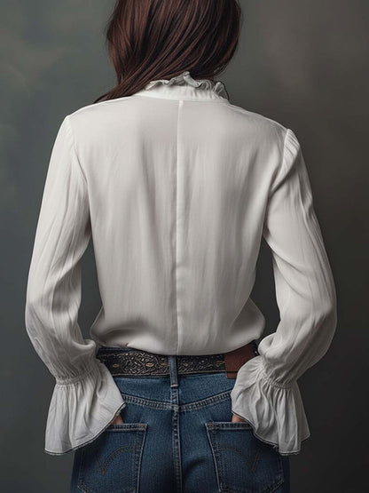 Blusa con zip sul davanti e polsini con volant – dettaglio 5