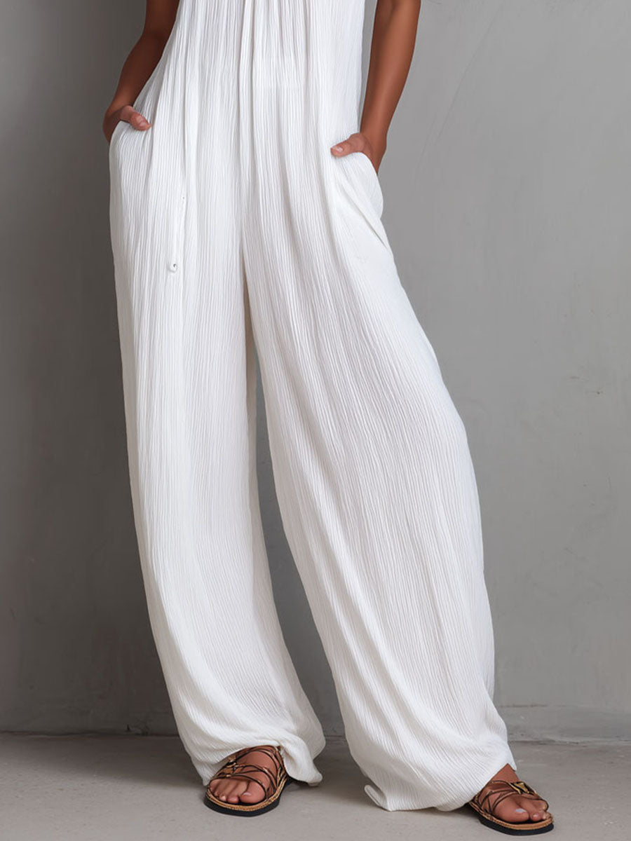 Tuta resort halter plissé – vista laterale