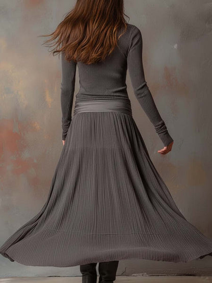 Vestito lungo in maglia a coste con gonna plissé – vista posteriore