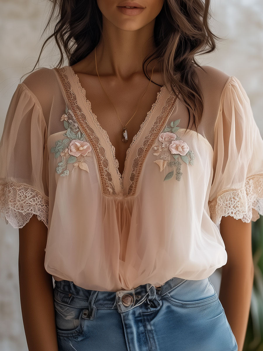 Camicetta boho rosa in chiffon con ricamo floreale – vista frontale