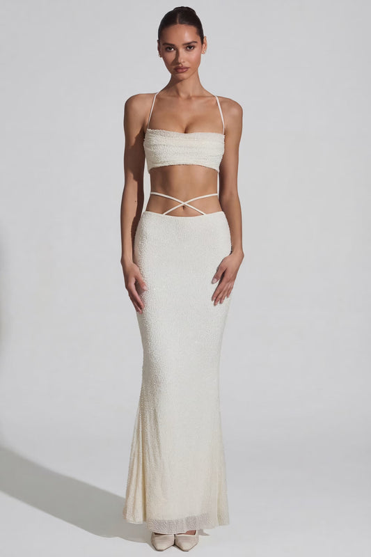 Top bianco con spalline incrociate – foto 1