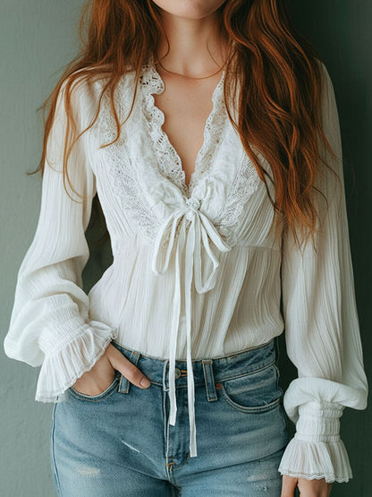 Blusa boho bianca con volant e pizzo – dettaglio 4