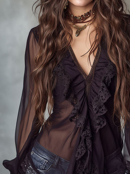 Blusa in chiffon nero con volant – dettaglio del tessuto