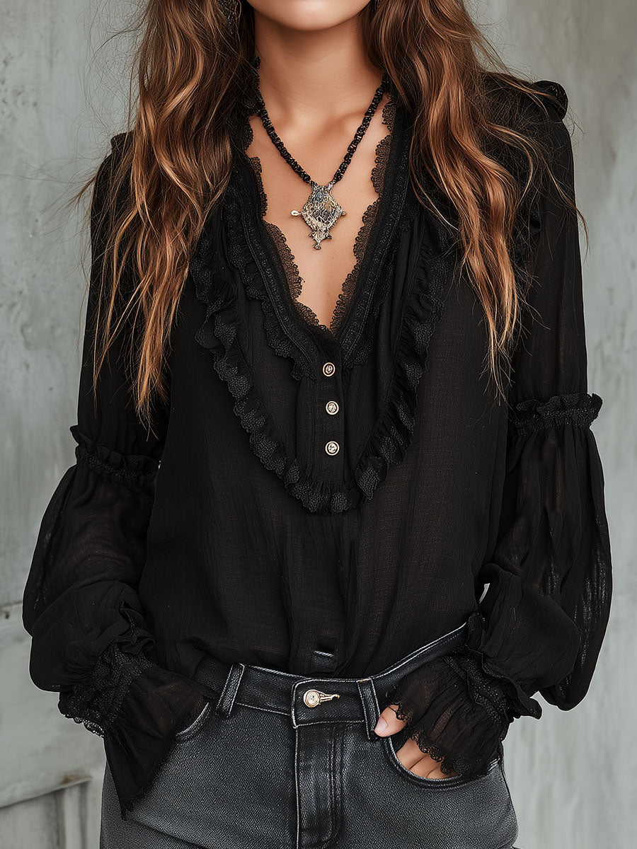 Blusa vintage nera con volant – vista frontale