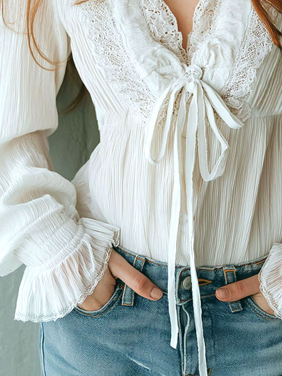 Blusa boho bianca con volant e pizzo – dettaglio 9