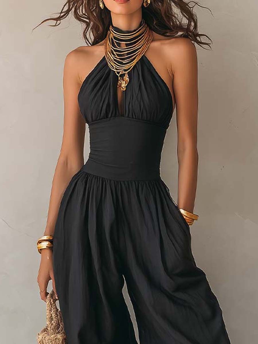 Tuta halter nera con pantaloni a palloncino – vista laterale