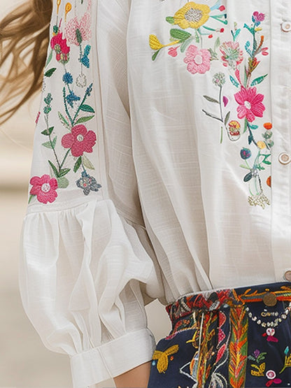 Camicia bianca in cotone e lino con ricamo floreale – vista frontale